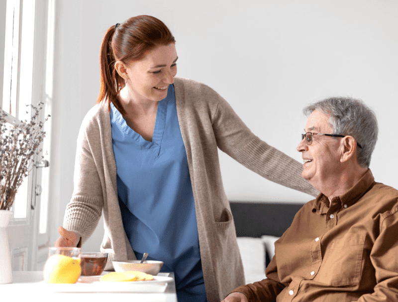 Caregiver-and-elderly-serving