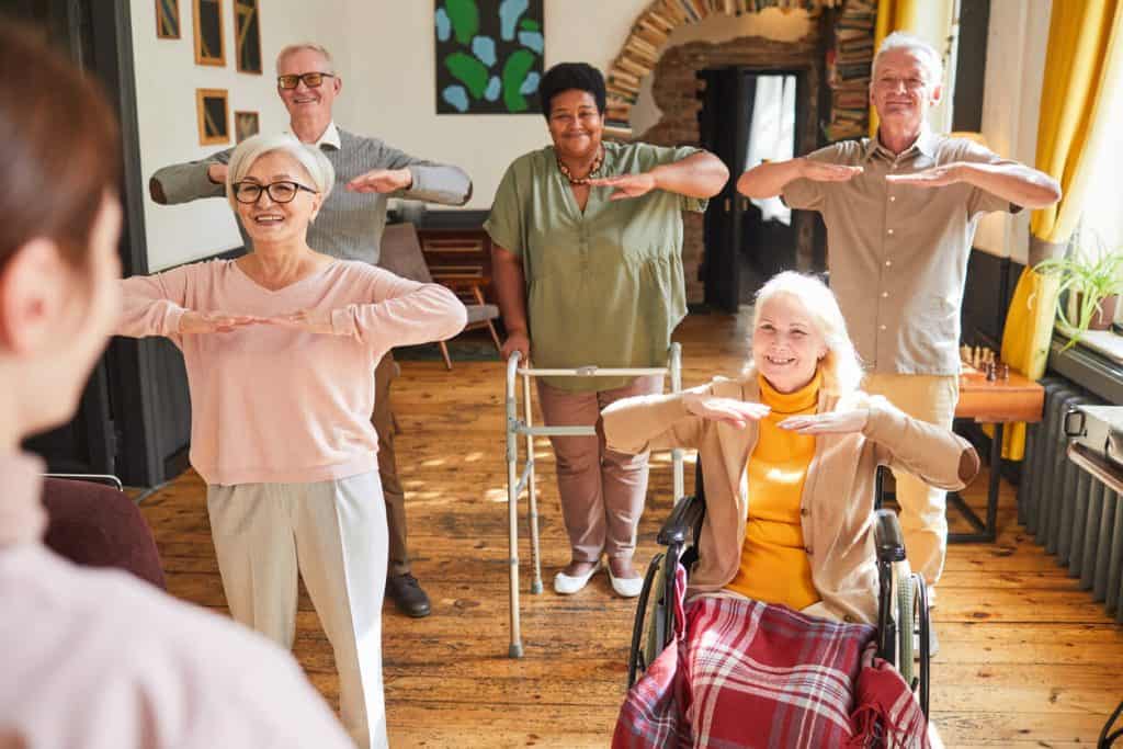 Older adults exercising in an assisted living community