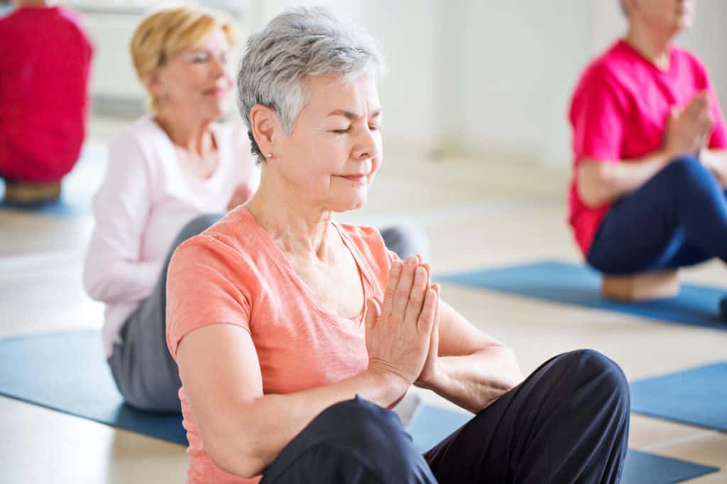 Senior ladies enjoying a short yoga class, possible senior homecare jobs