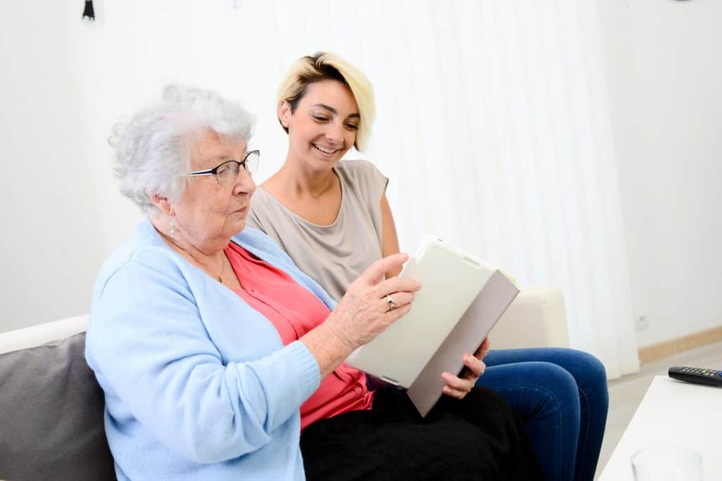 A caregiver taking care of an Alzheimer's patient. Homecare classes