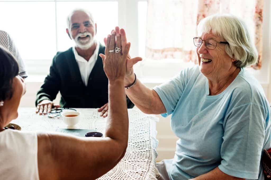 Some seniors enjoying quality time together, independence assisted living