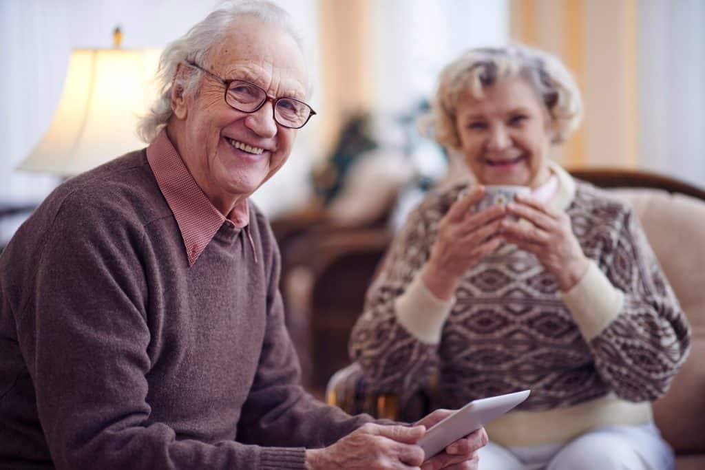 A happy elderly couple enjoying quality time at home for elderly, elderly help