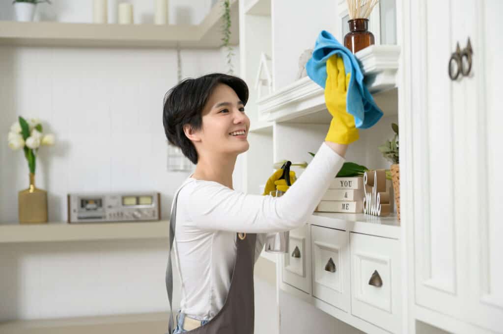 Caregiver doing household chores skilled home care services