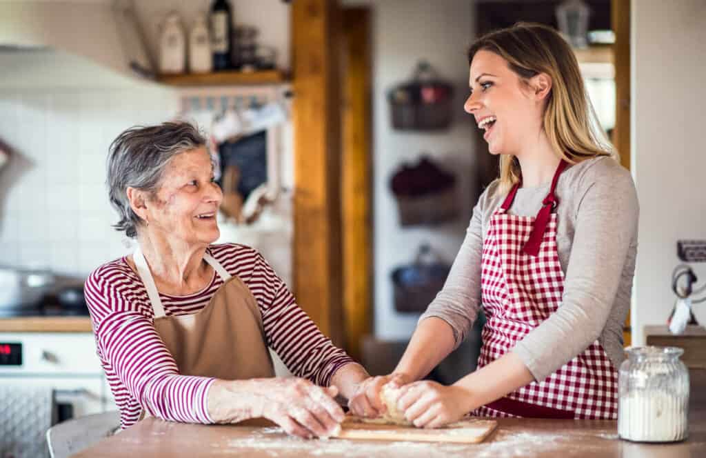 sitting services for seniors engage in meaningful communication