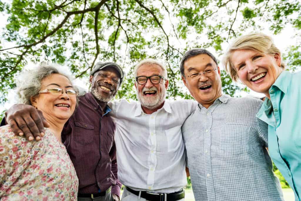 Group of older adults smiling and happy on national day of joy