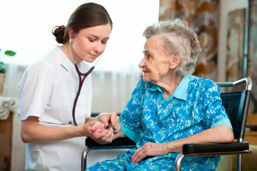In-home support service to and care to a senior woman with her caregiver at home