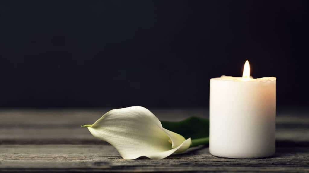 Lighting a candle in memory of your loved one | family