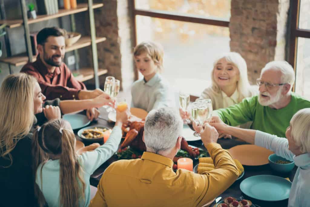 When did national Grandparents Day star | A family having a simple lunch party.