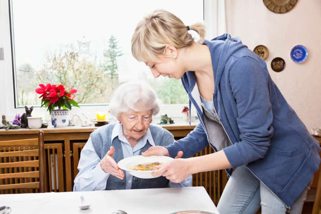 home senior care jobs - providing warm meals are part of the senior care job
