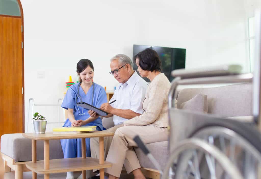 seniors and a caregiver planning together