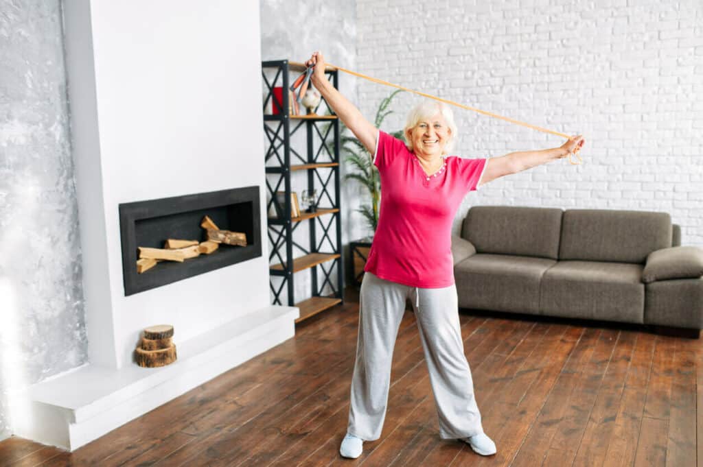 a senior woman training at home - balance activities for adults