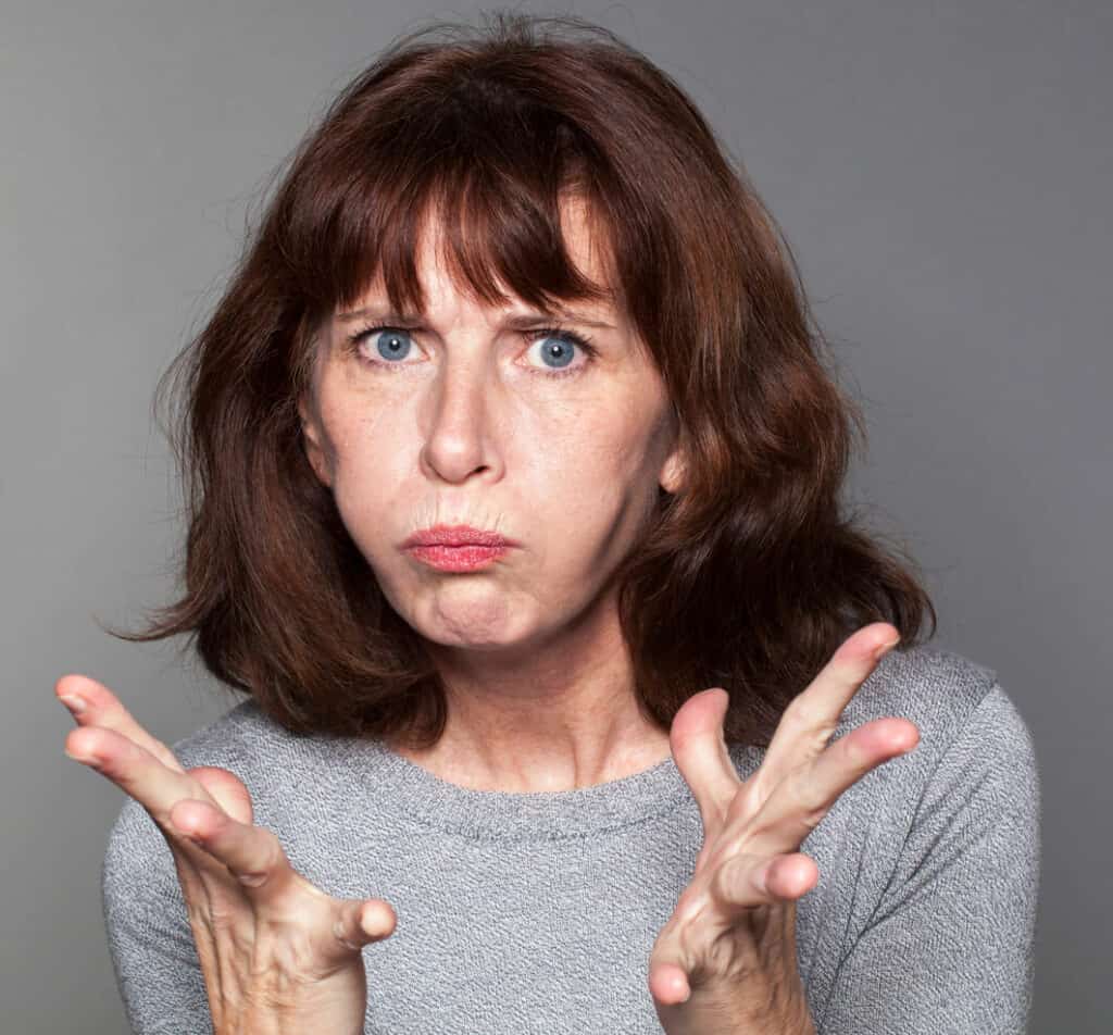 women with a frustrated expression symptom of depression