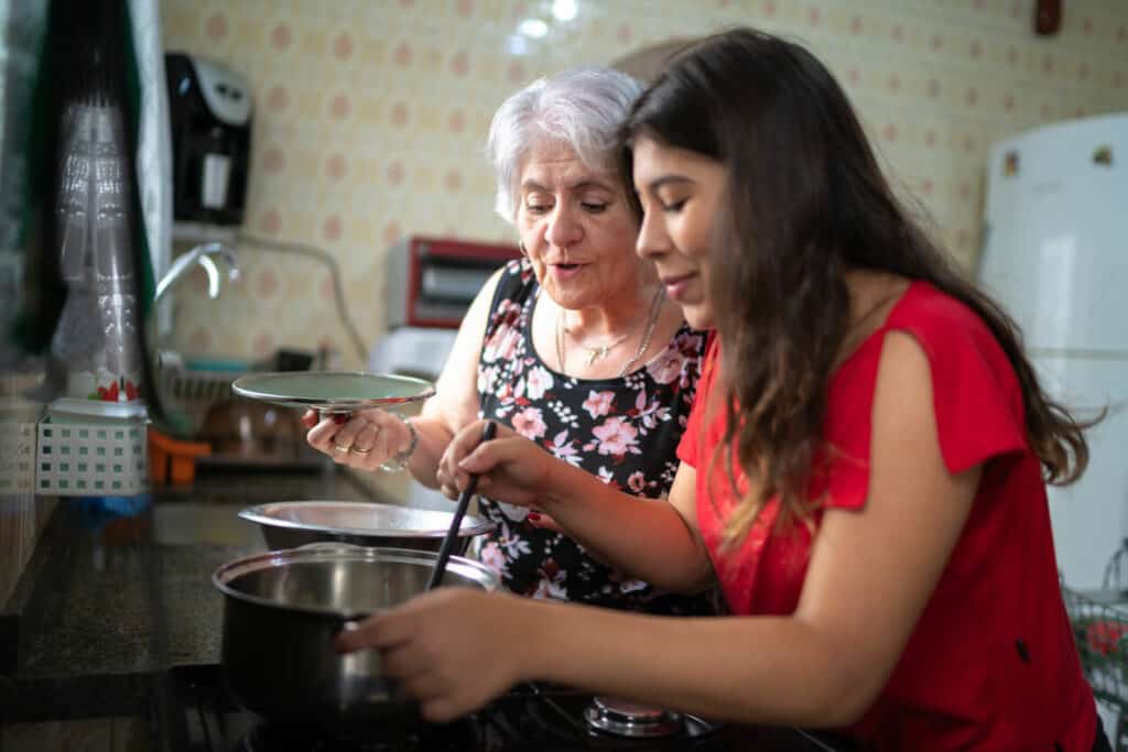Grandmother and granddaughter making a brain-healthy meal