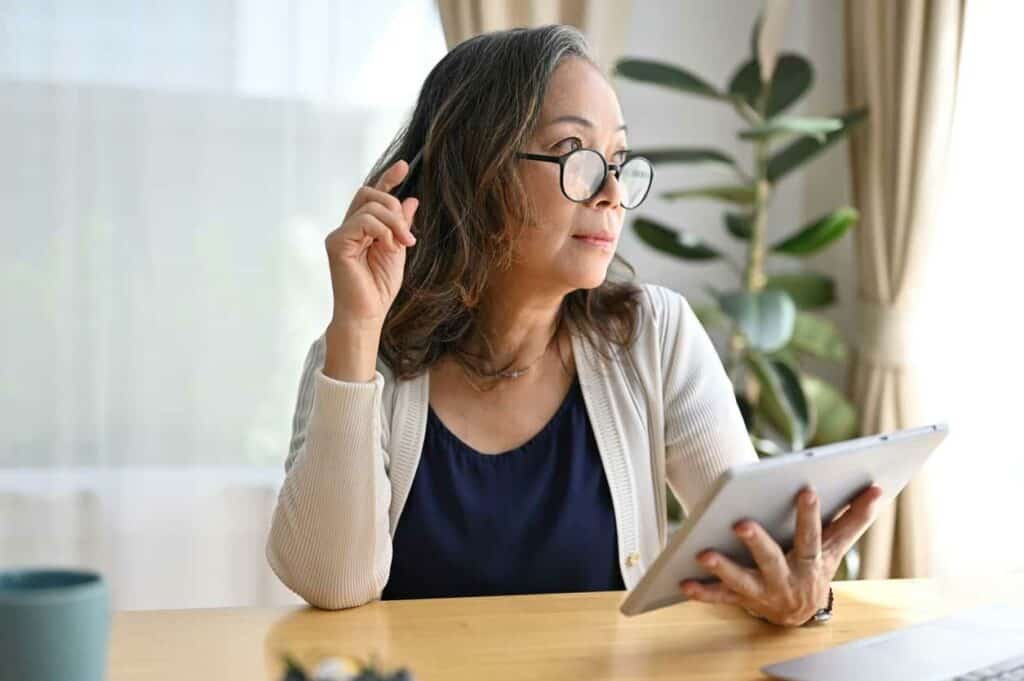 Memory care Carson City Nevada - a senior woman thinking about her options for retirement.