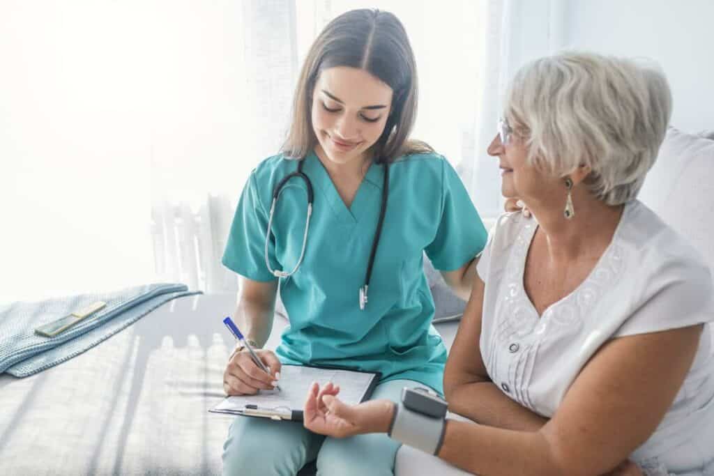 Long-term care facilities vs. nursing homes: senior woman having a health checkup at a nursing home