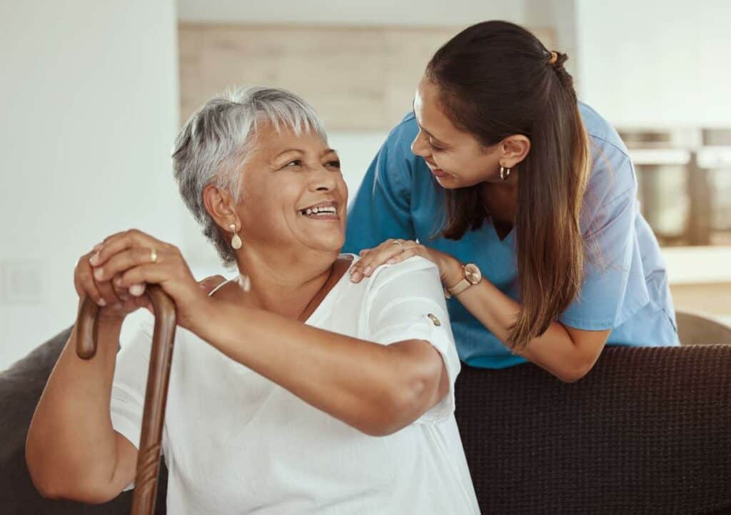 senior woman and her caregiver in a residential assisted living home