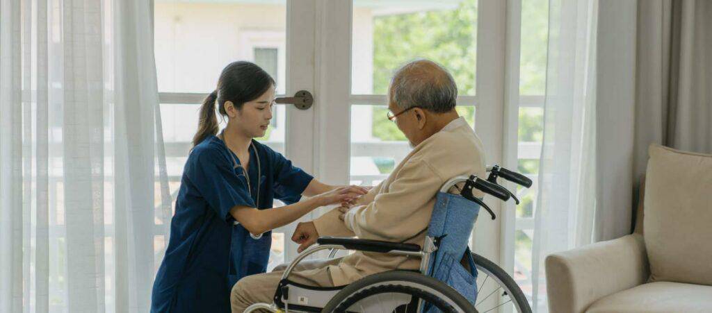 what is a palliative nurse - palliative nurse providing care for an elderly man at home