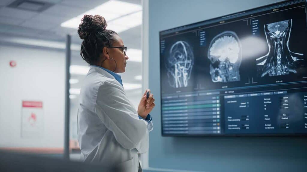 A Neurologists checking out the MRI results of a patient