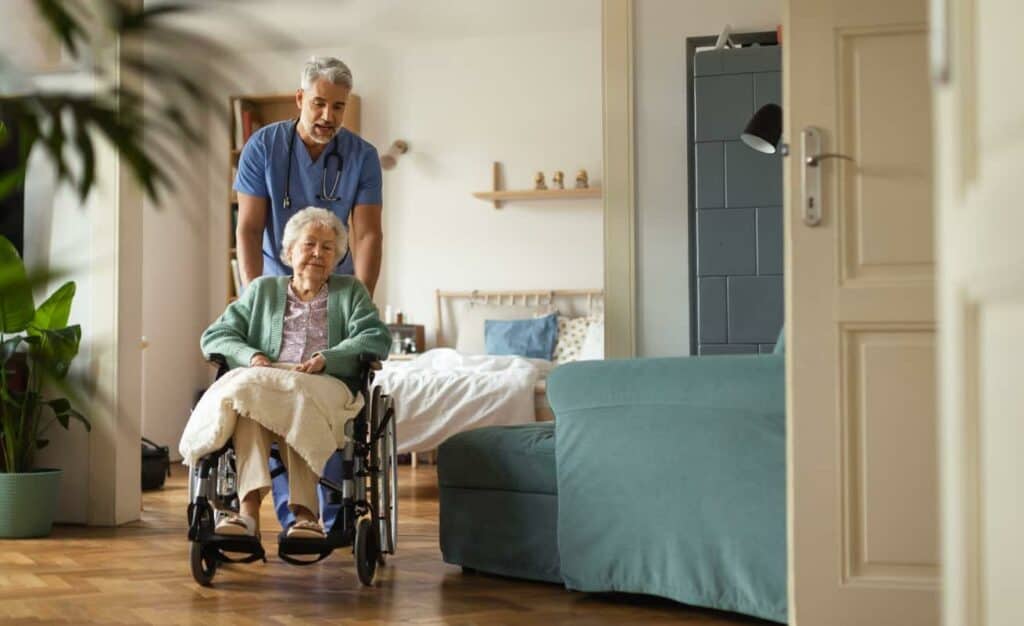 palliative care doctor checking on a patient in a home setting