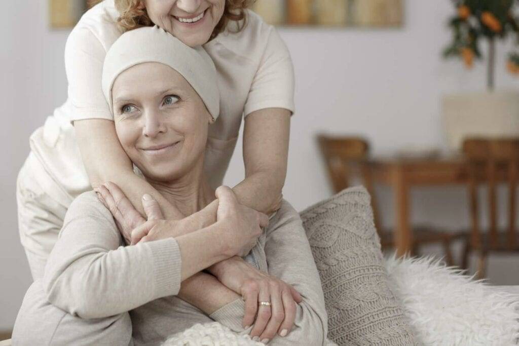 A family member showing support for a loved one during chemotherapy - palliative care programs