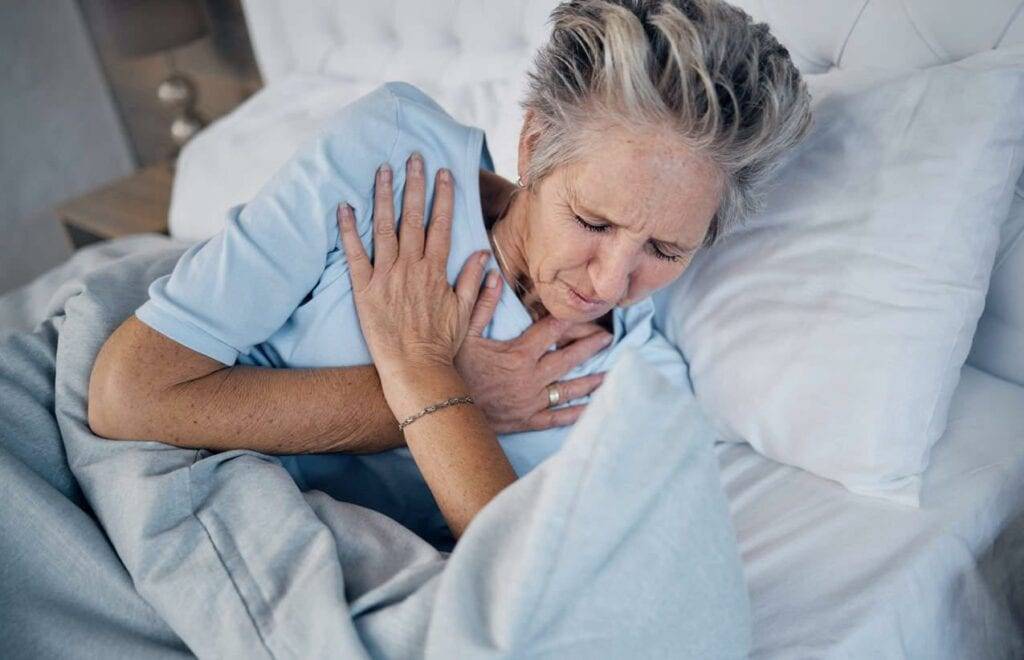 a senior woman exhibiting signs of approaching death at home