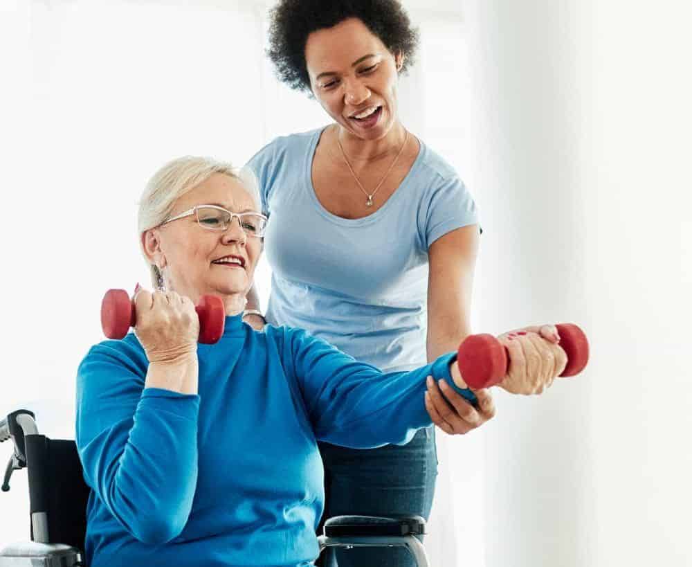 doctor of physical therapy with elderly patient