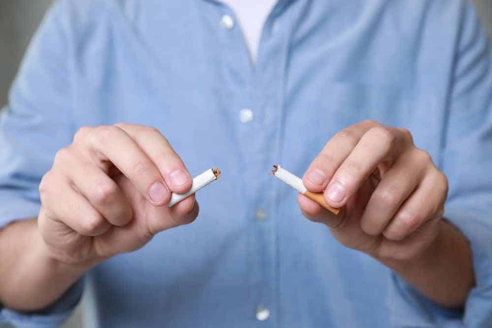 a licensed physical therapist discouraging the patient from smoking