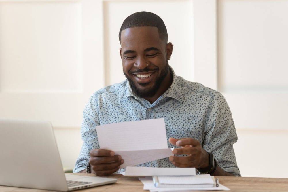 a male student going through his field of physical therapy application form