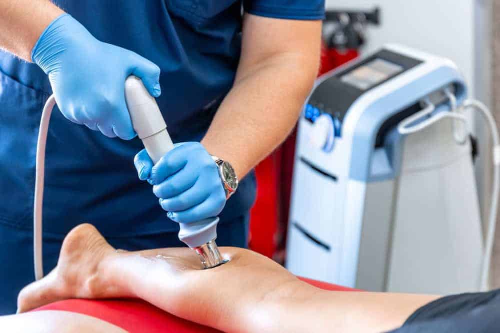 Eletrical simulation being used on a patient to promote healing