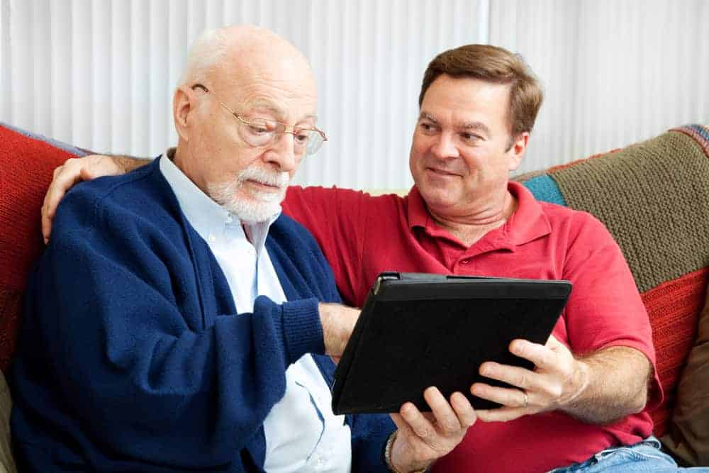 homecare jobs - male caregiver spending time with a senior man