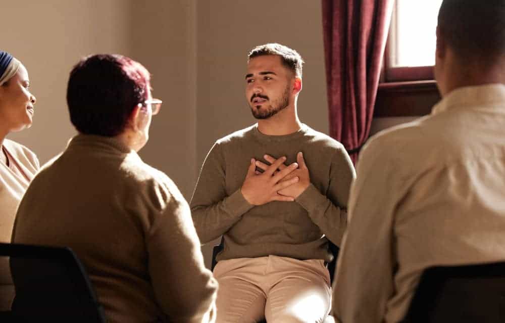 caregivers sitting in a caregivers support group - assisted living with dementia care