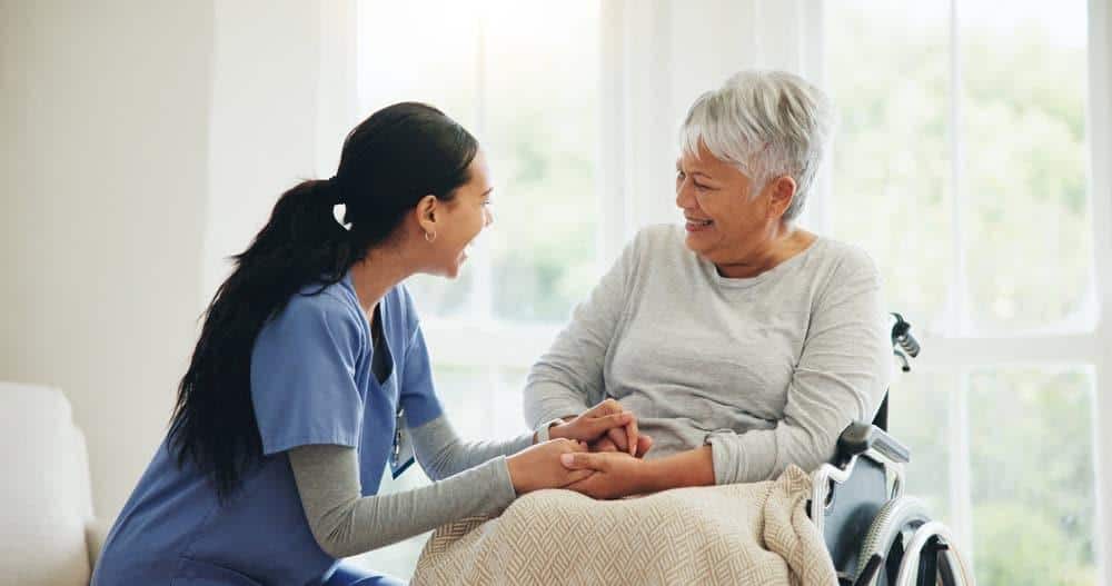 Happy caregiver and elderly woman - Home care services | homecare work