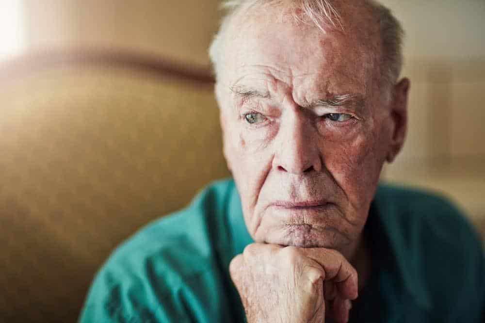 sad senior man - what services do home health aides provide