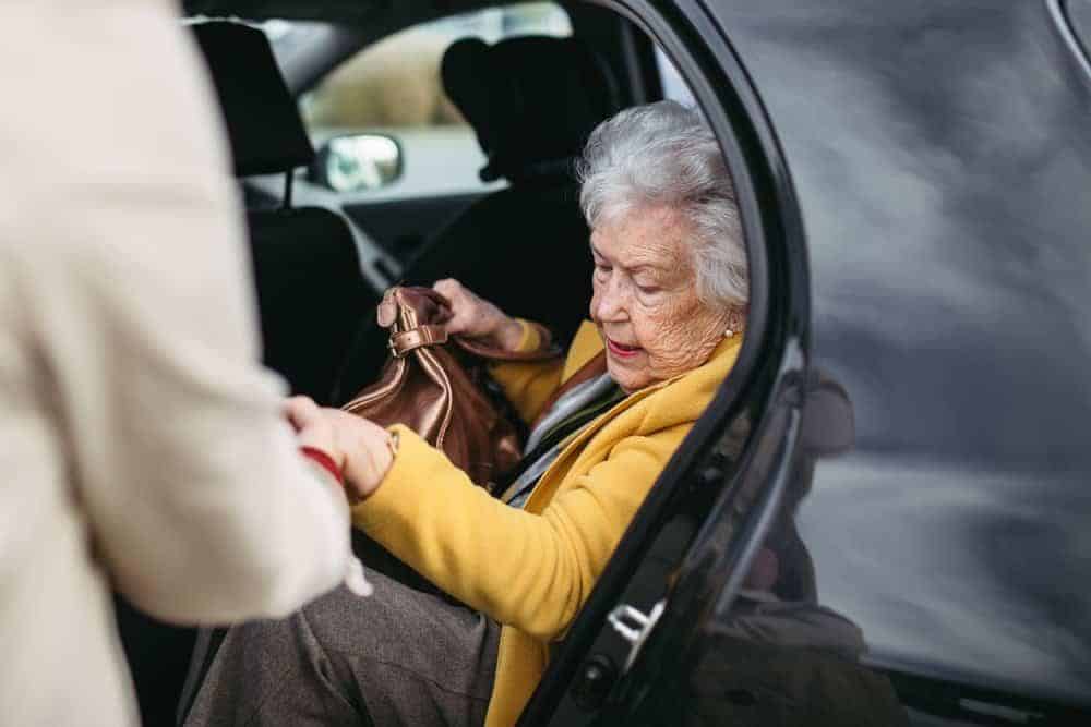 Senior lady moving to an assisted living home