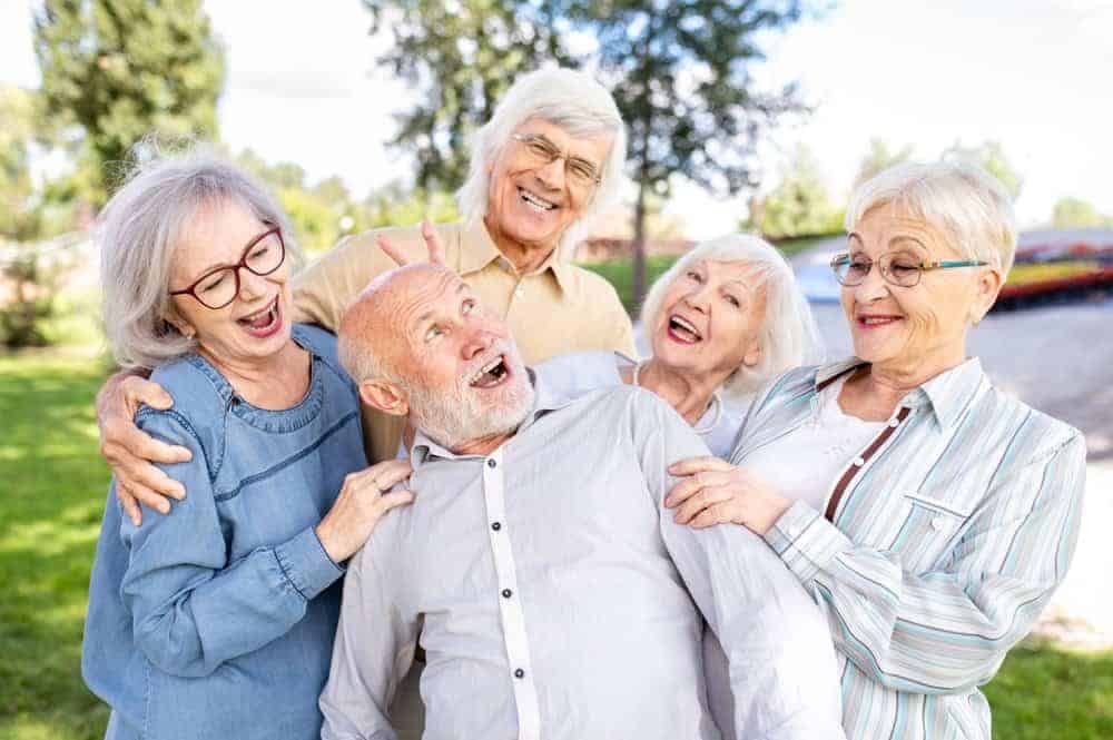 a group of happy seniors after their recreational time - residential care facility