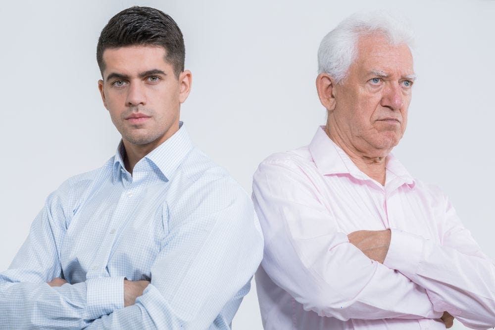 an older man feeling hurt after a conversation with his son