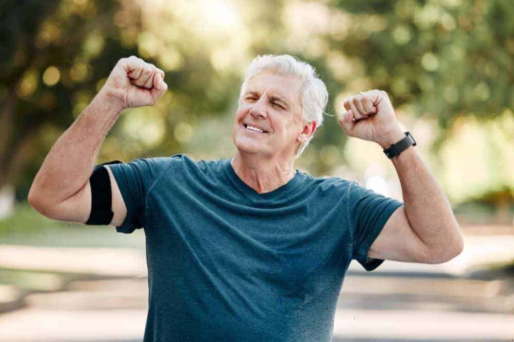 strong and healthy senior man maintaining independence with exercise