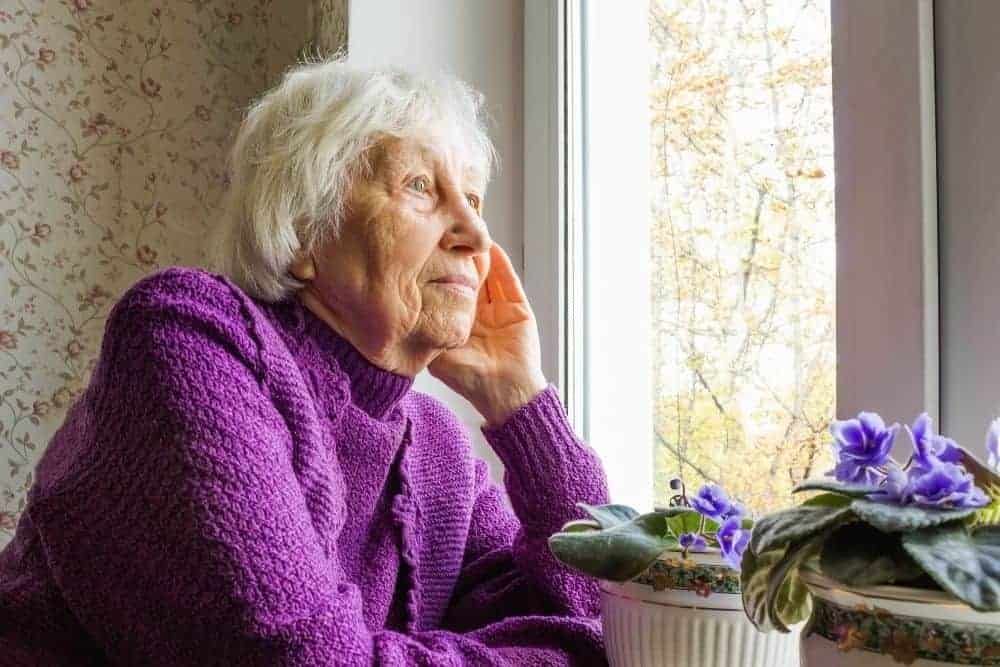 Older woman with dementia slowing loosing elderly independence