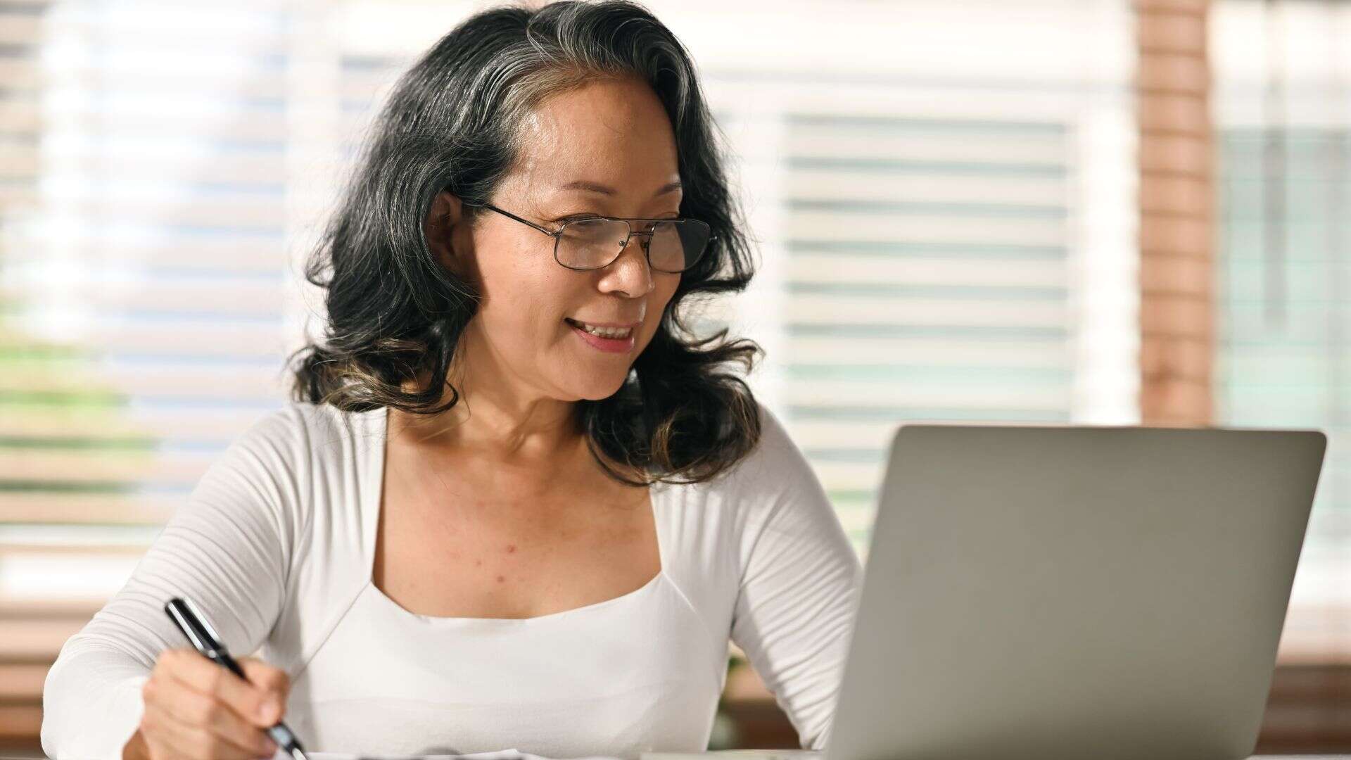An adult daughter evaluating her parent's needs to decide between memory care vs assisted living in Reno, NV.