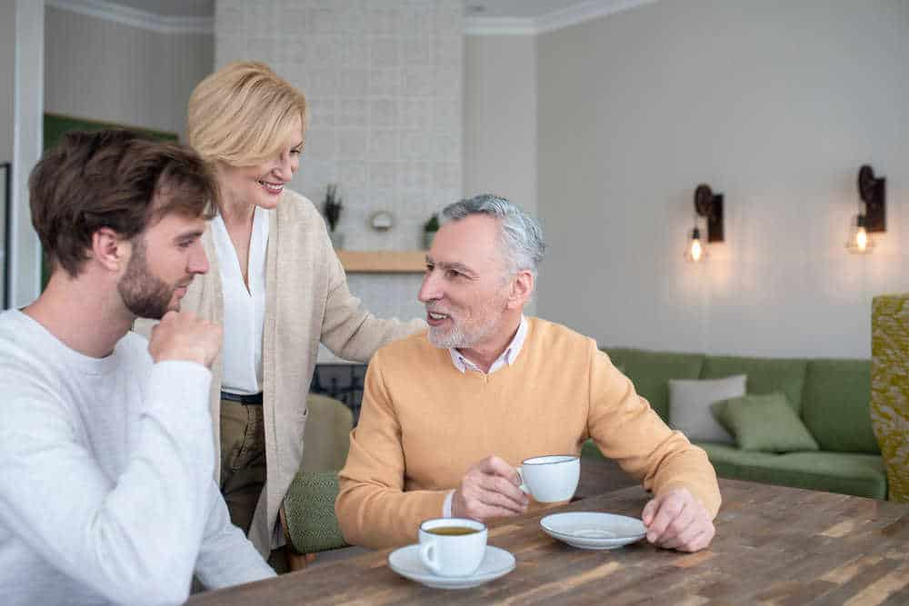 A family discussing senior living options together at a table