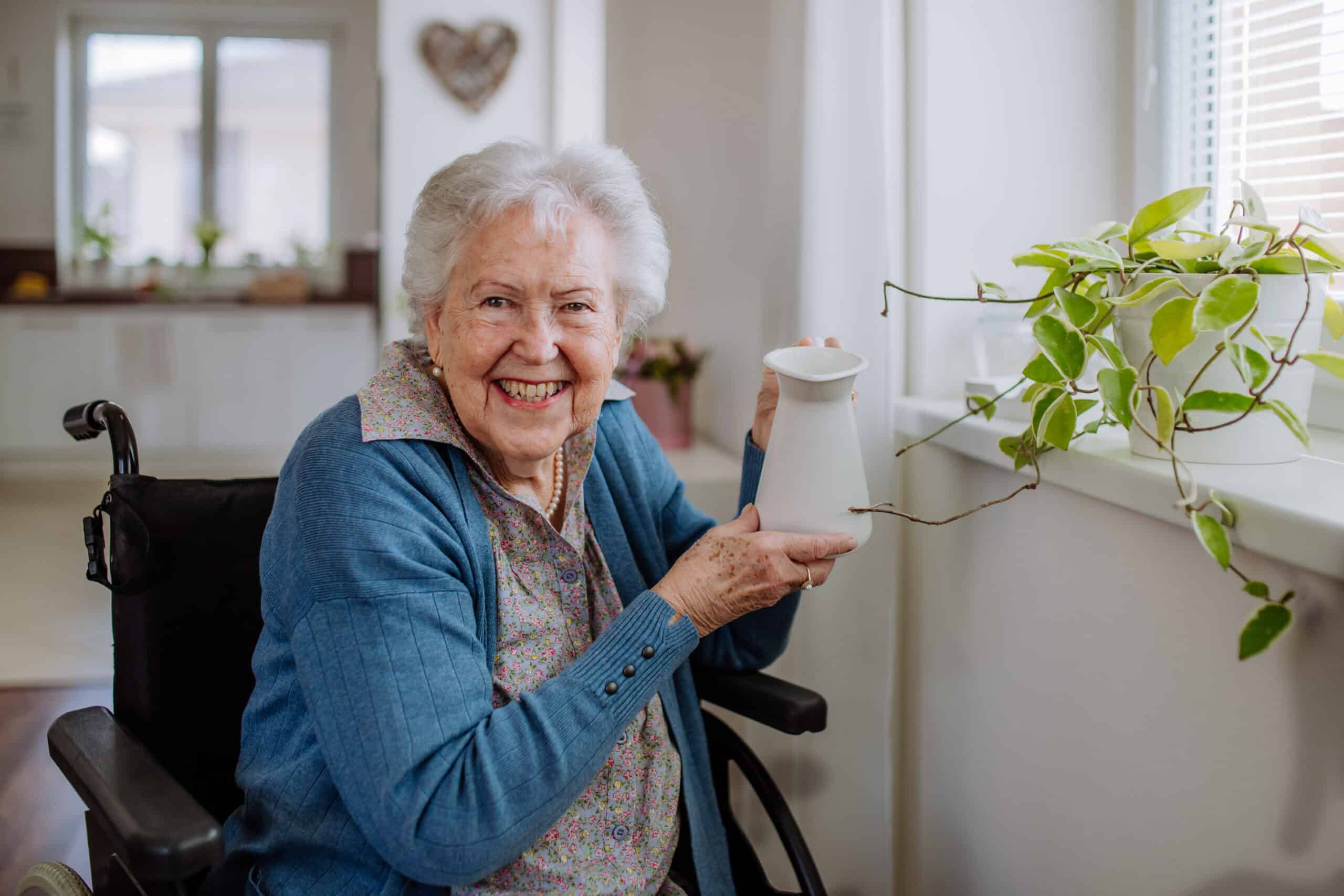 A senior resident enjoying personalized care in a real home, an alternative to a traditional nursing home.