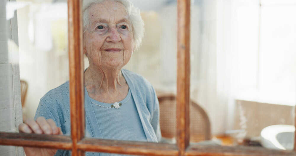 A resident in a Reno senior home reflecting.