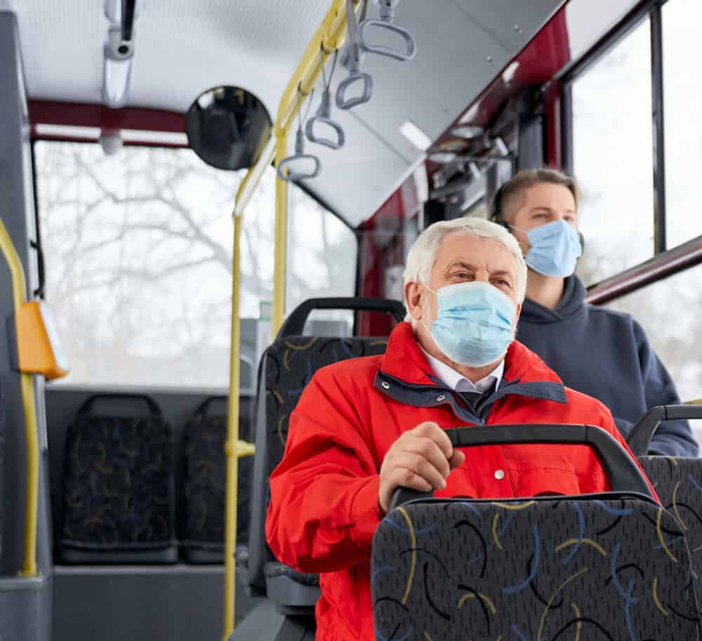 RTC ACCESS driver assisting a senior citizen onto a paratransit bus in Reno, Nevada